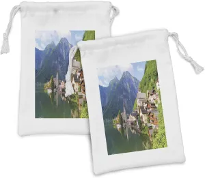Ambesonne Nature Fabric Pouch Set of 2, Idyllic Alps Village Small Town by Majestic Mountain Lake European Pastoral Scenery, Small Drawstring Bag for Toiletries Masks and Favors, 9" x 6", Multicolor