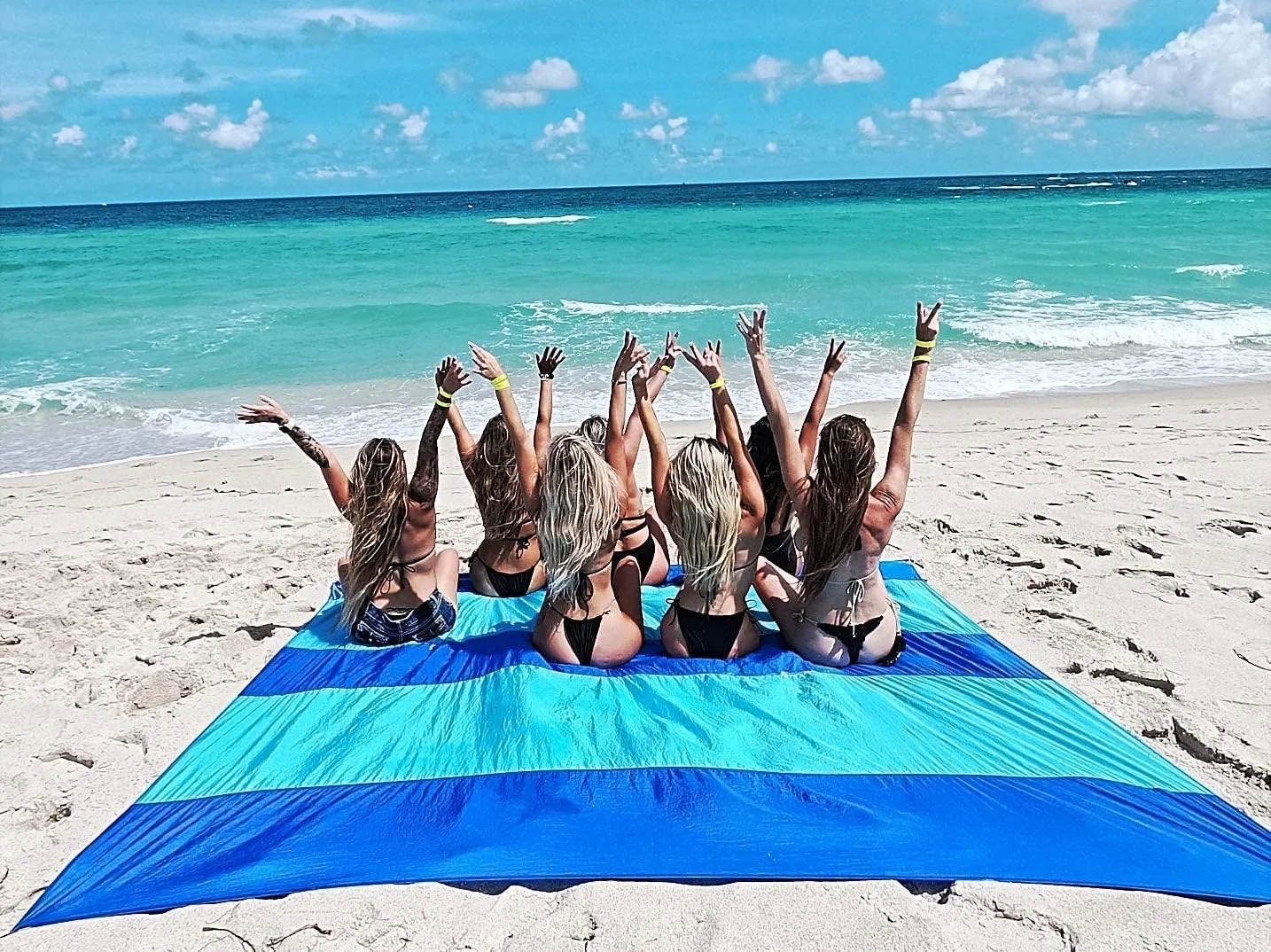 Premium XXL Beach Blanket Sandproof Water Resistant Quick Dry Mat 10ft by 9ft for 1-8 Adults with 4 Metal Stakes, 4 Corner Pockets, Secure Clip and Strap, and Attached Bag