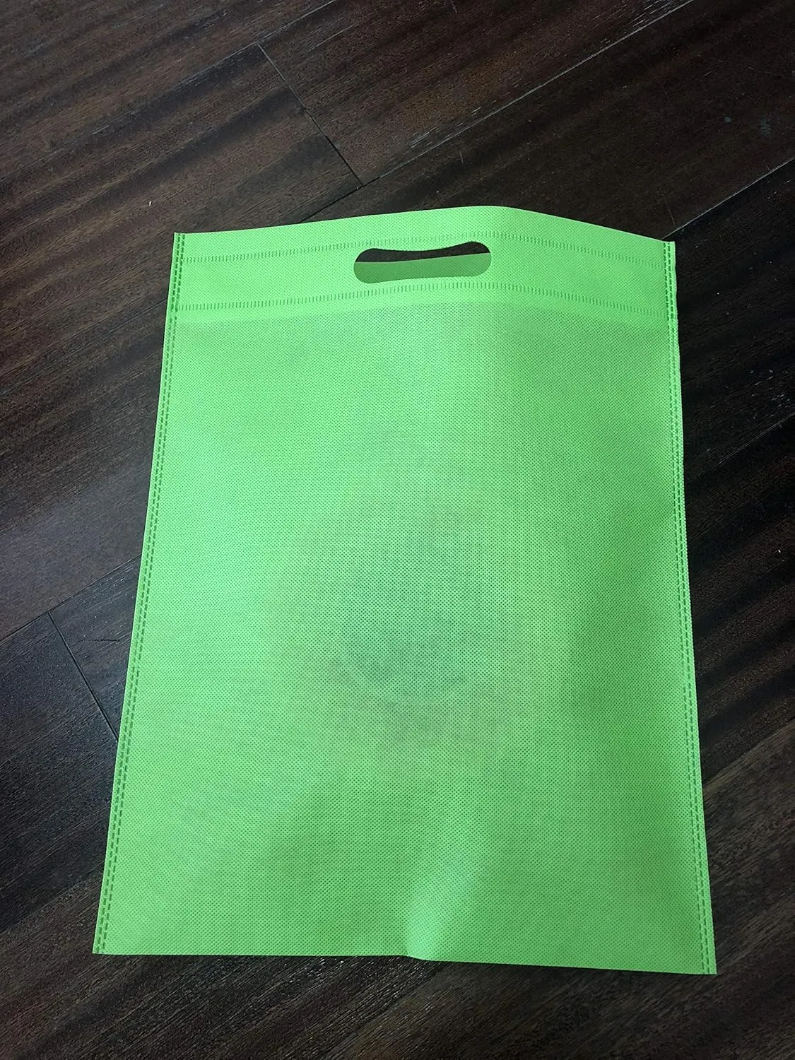 Set of 48 Promotional Nonwoven Heat Seal Reusable Tote Party Bag, Goodie Bags, Gift Bags Bulk With Die Cut Handles (Bright Green)
