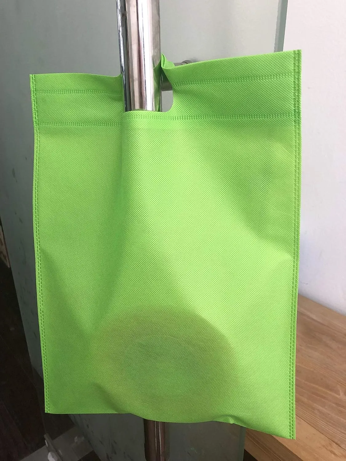 Set of 48 Promotional Nonwoven Heat Seal Reusable Tote Party Bag, Goodie Bags, Gift Bags Bulk With Die Cut Handles (Bright Green)