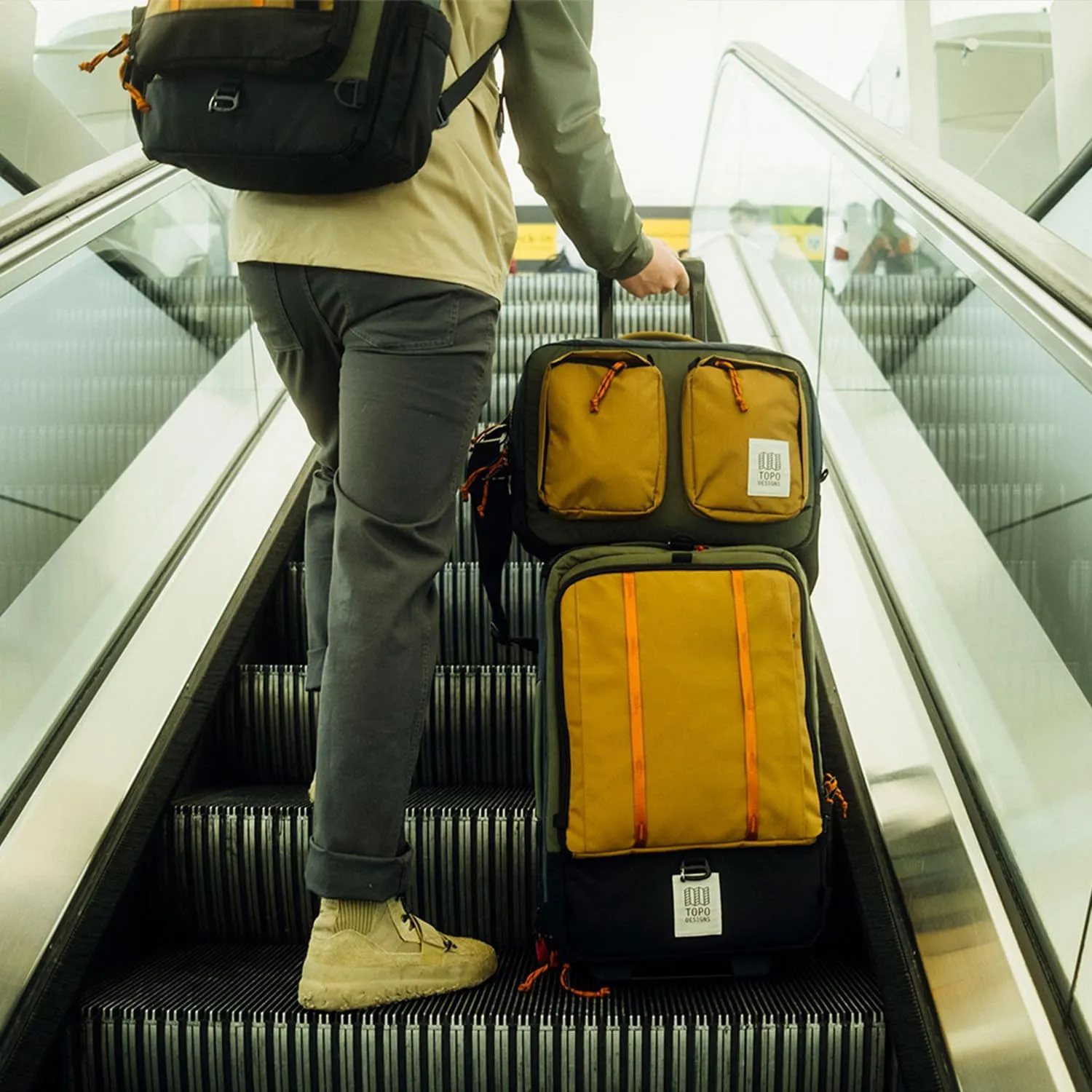 Topo Designs Global Travel Roller Bag Suitcase, 44L Carry-On, 3 Handles, Smooth Heavy Duty Wheels, Telescoping Handle, Durable   Rugged, WRAP Certified (Denim)